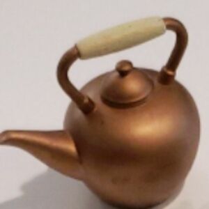 Elegant Copper Teapot with Cream Handle